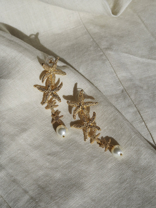 Falling sea star earrings